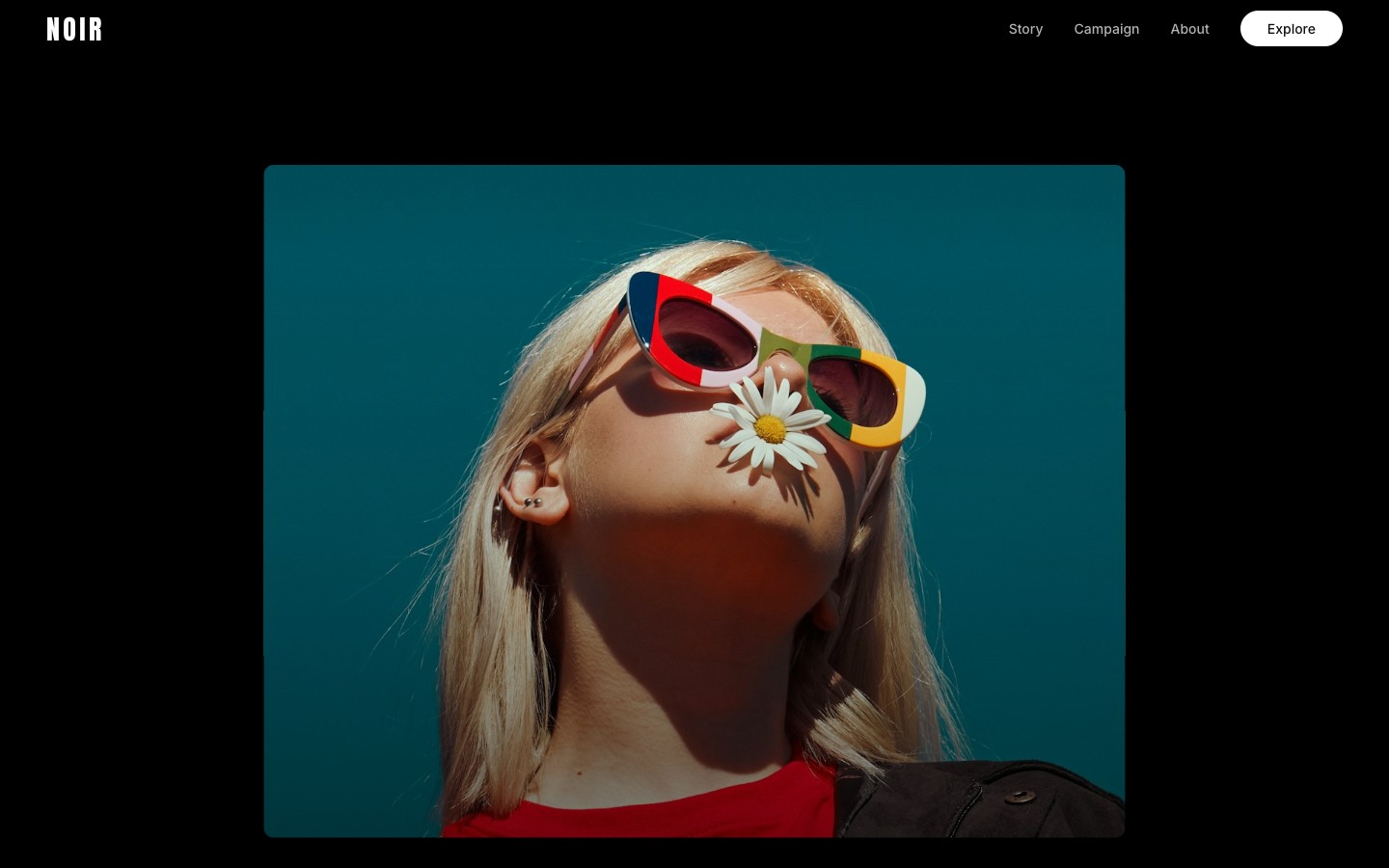 The hero background mid-shrink — contracting from full-bleed into a rounded card with black void expanding around it